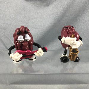 2 California Raisin Applause Calrab 1987 Saxophone Player 1988 Pink Guitar 2.5"